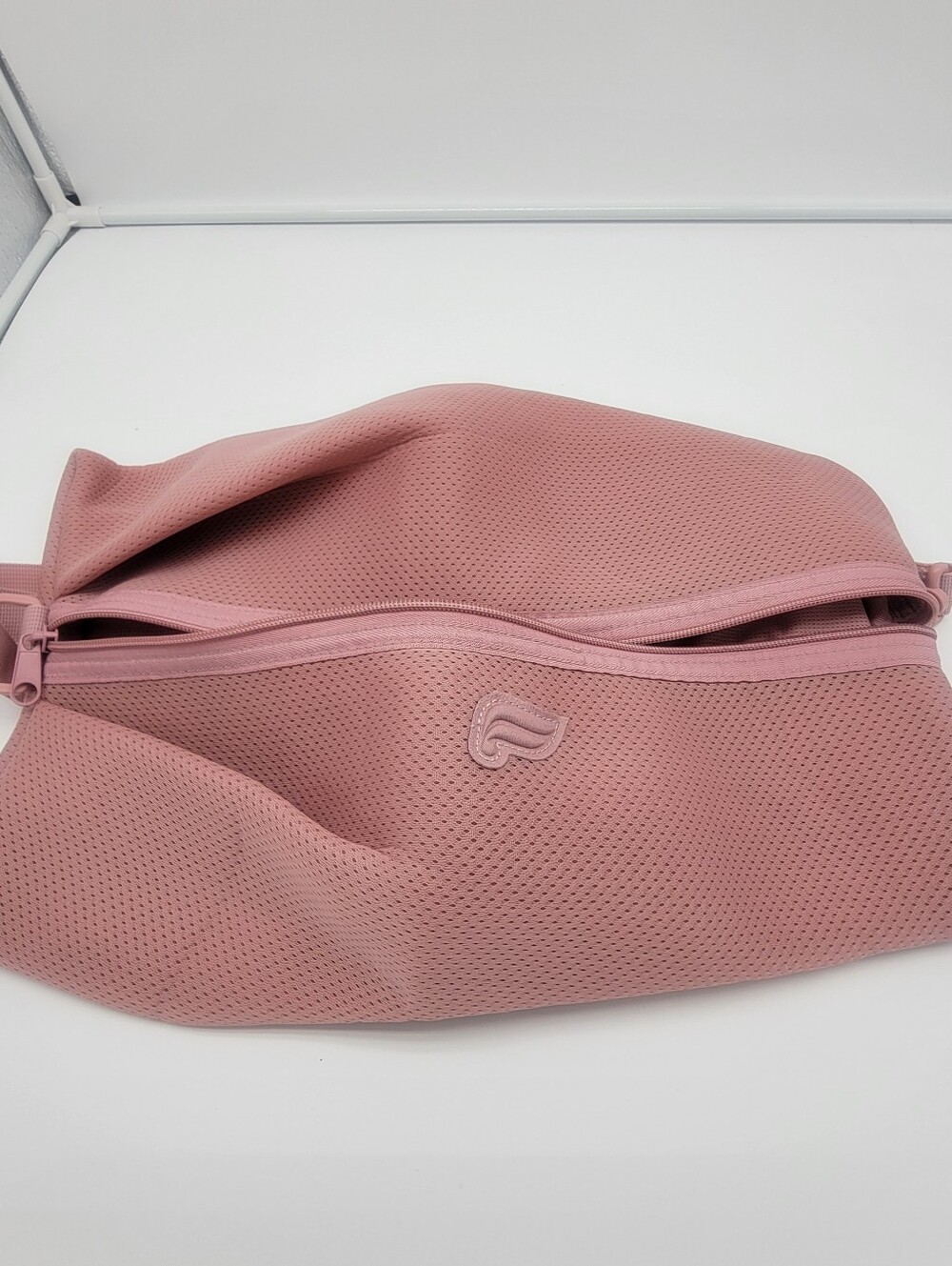 Fabletics Dusty Rose Perforated Neoprene Wristlet